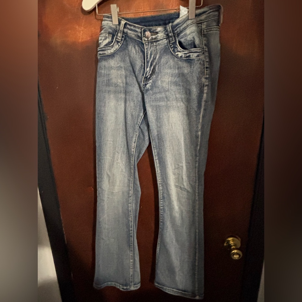 Light Wash flared Leg low waisted jeans